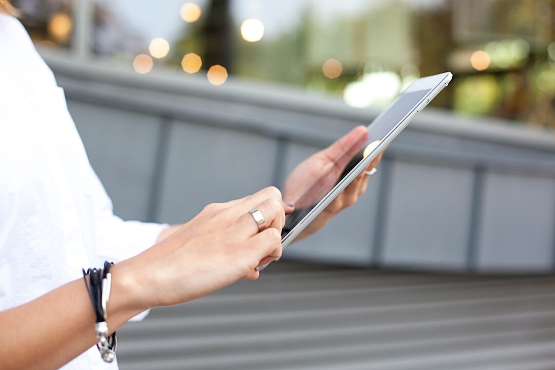 person using tablet for learning
