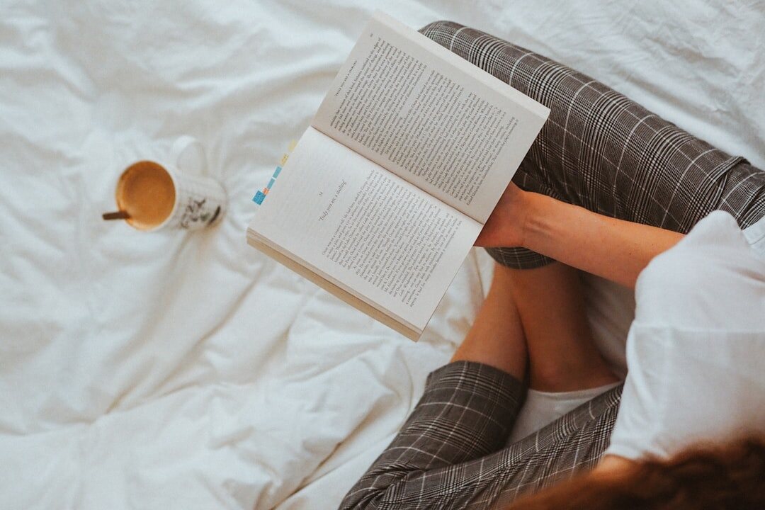 woman reading old book